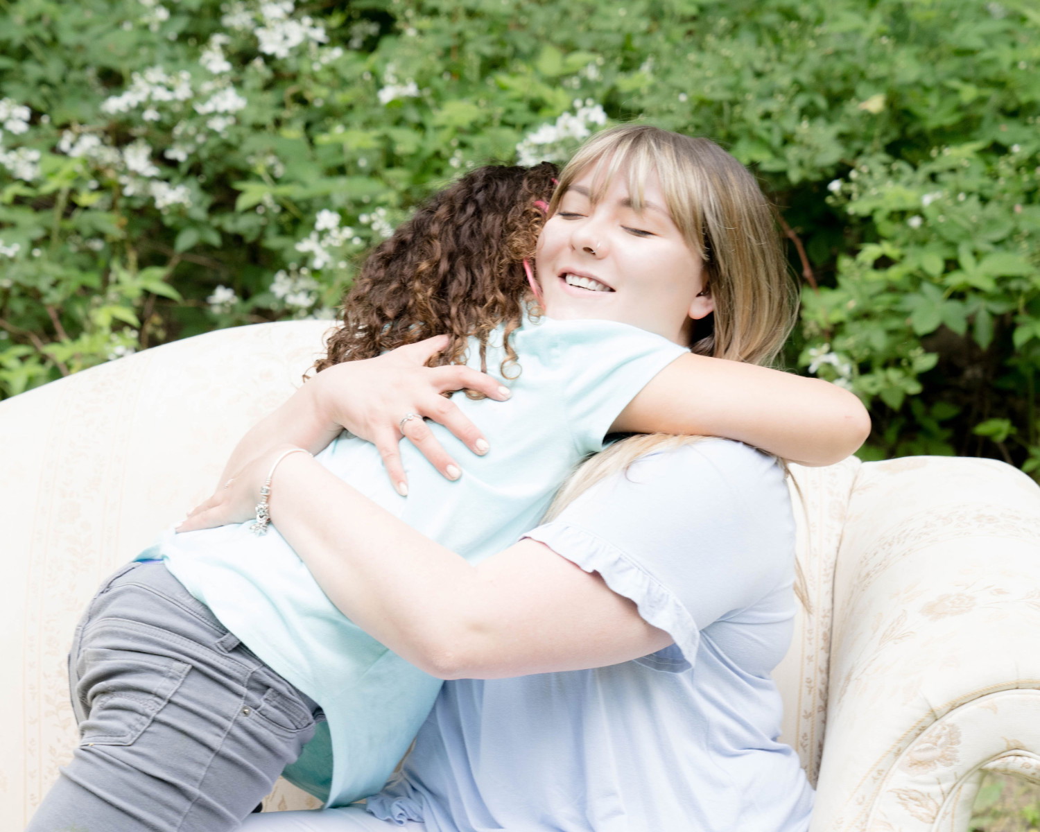 daughter hugging birth mother