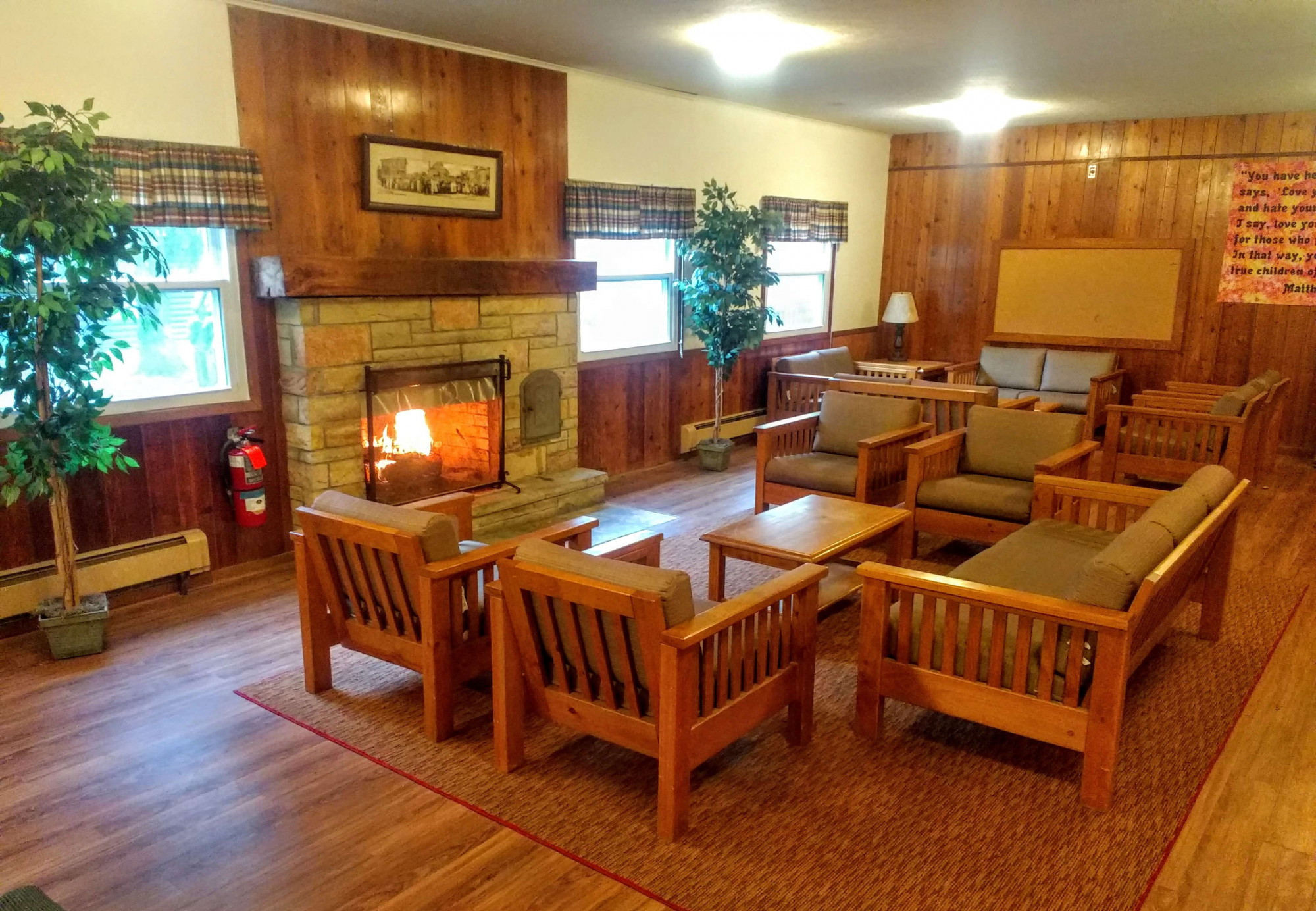 Cozy cabin-style lounge room with fireplace