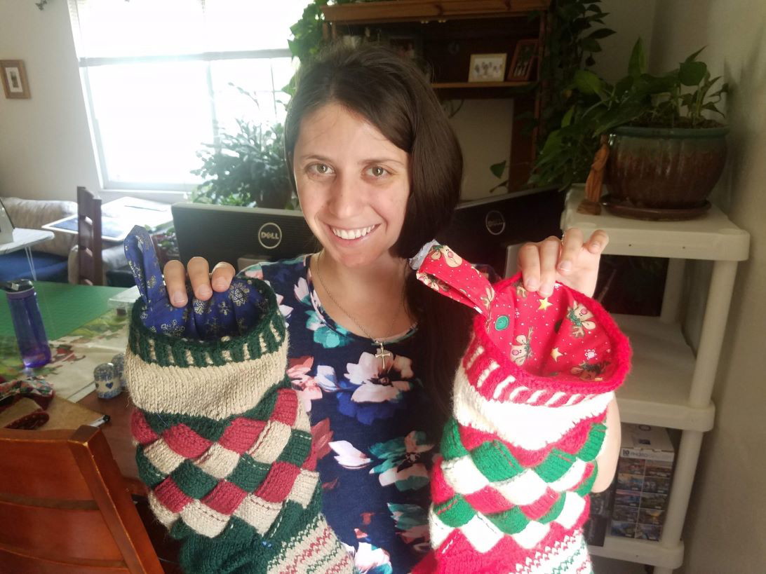 Caitlin with knitted christmas decor